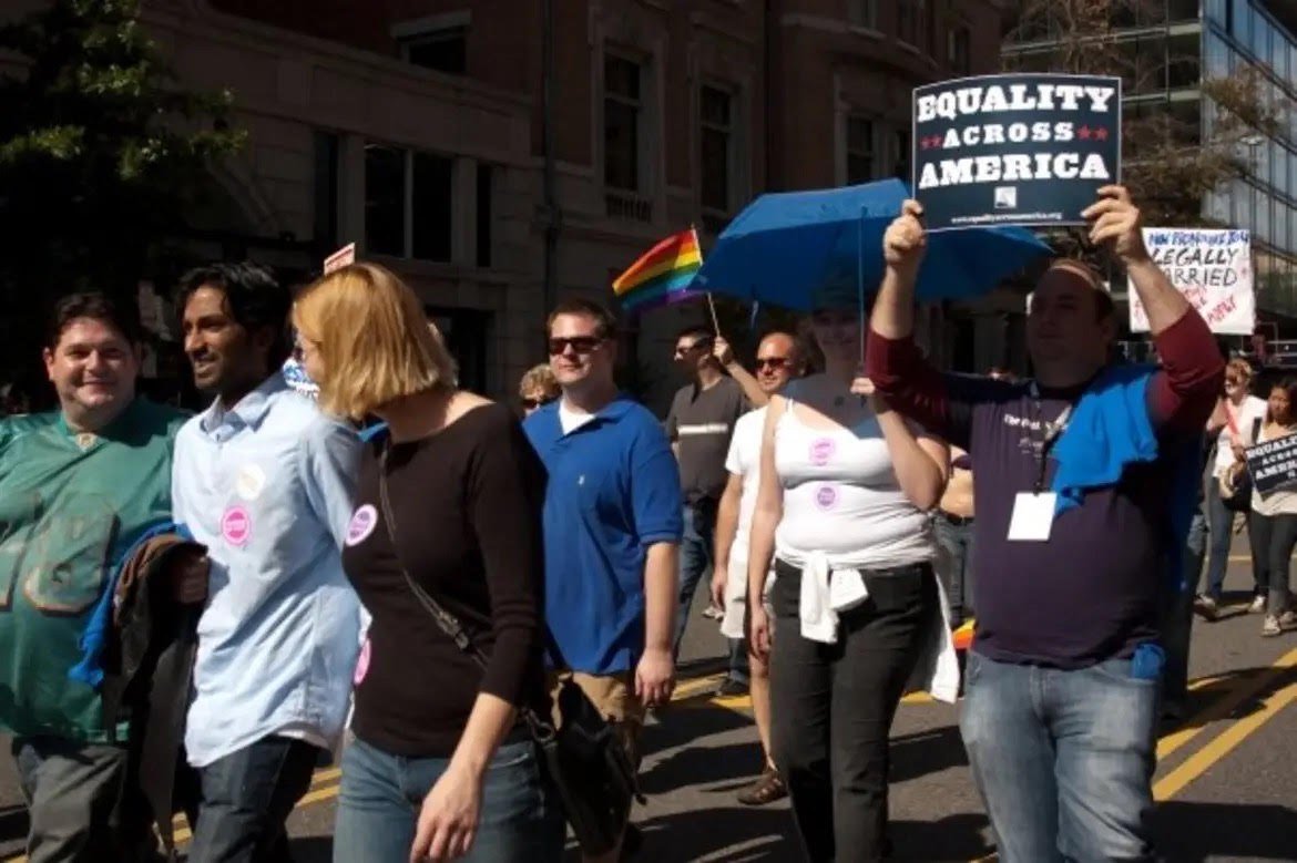 Arjun marches for marriage equality with Laura and friends in 2009